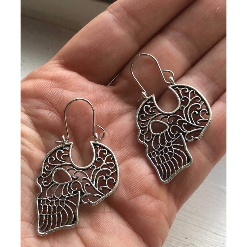 5/$20 Gothic Carved Skull Dangle Earrings - Picture 1 of 5